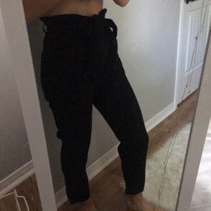 Black pants with a bow